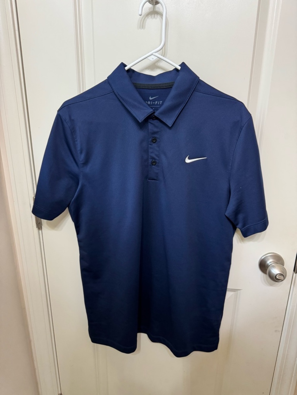 Nike Men's Dri-FIT Polo Shirt in Navy with White Swoosh